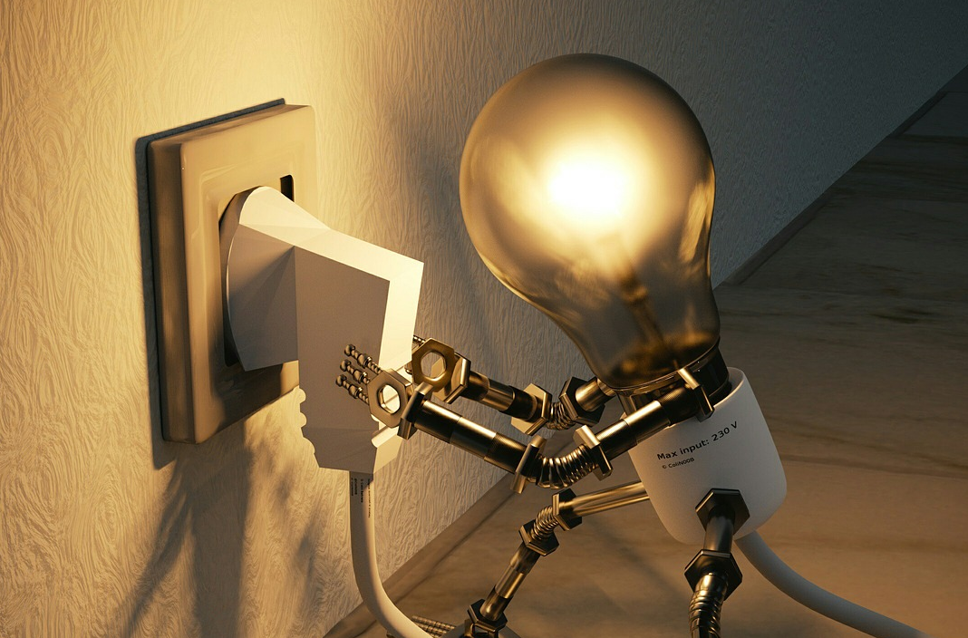 Light bulb plugging itself in to give more light.
