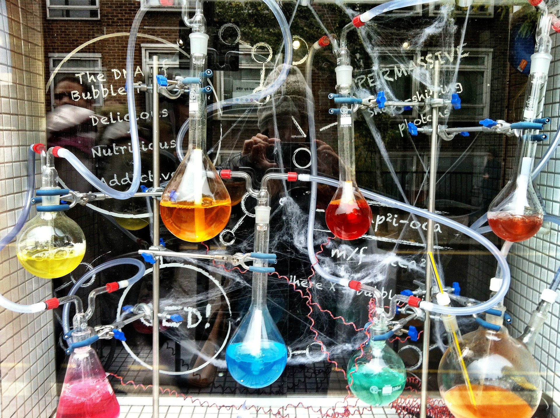 Various colourful and interconnected chemistry flasks.