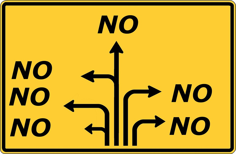 Road sign with multiple arrows in multiple directions all ending up at the word NO